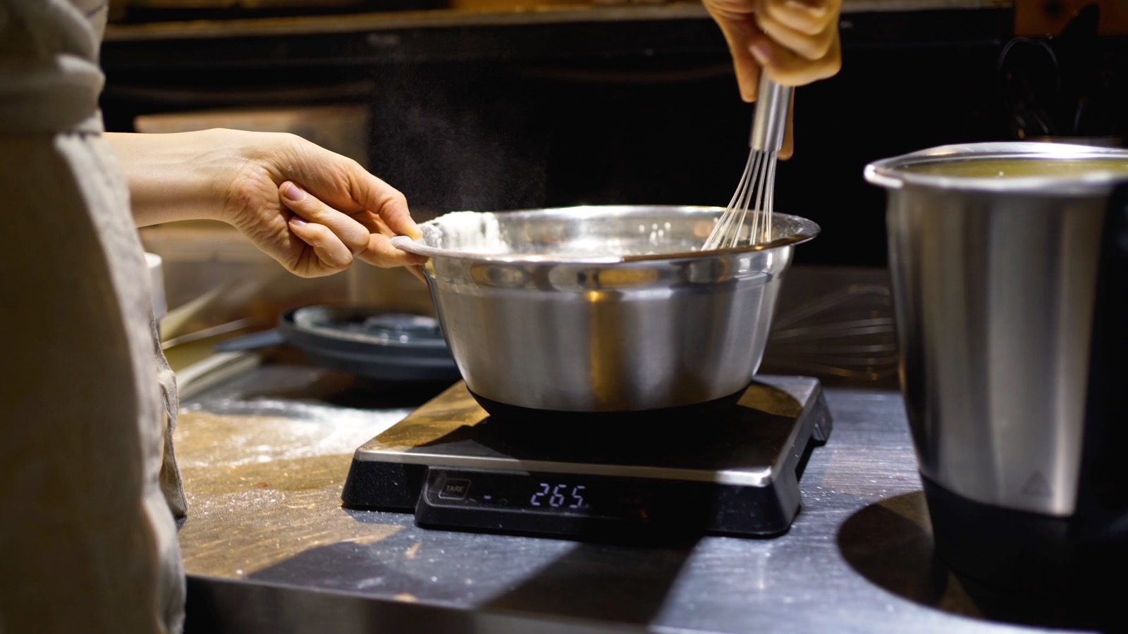 Weighing ingredients on a kitchen scale